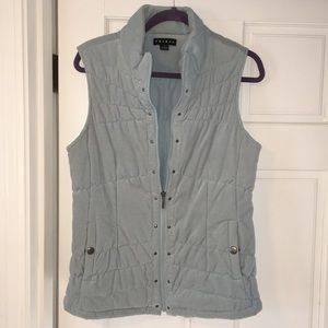 Light blue thin corduroy vest.
